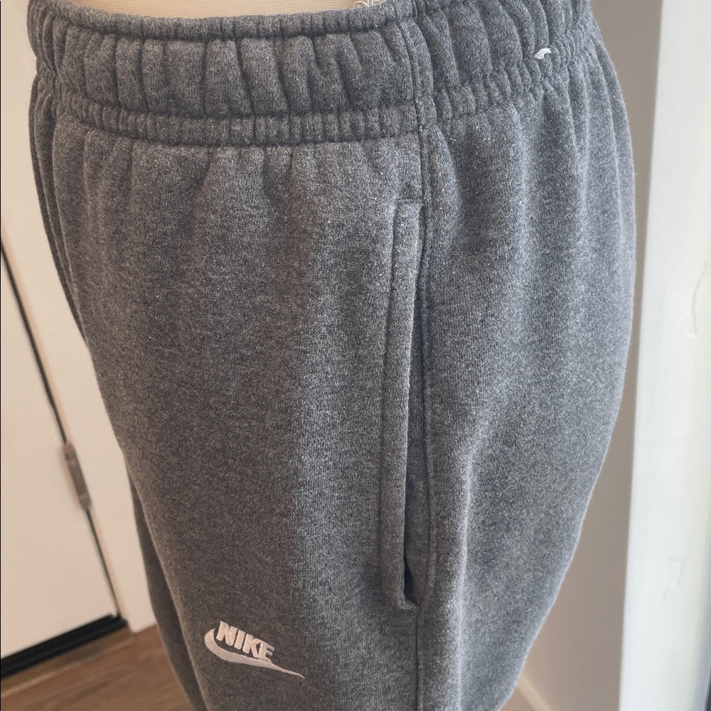 Nike Big Kid’s Fleece Joggers. Drawstring waist. Snap  pocket. Comfortable. Gray - Picture 3 of 10